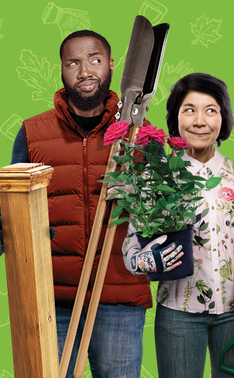 Man holding a shovel and plant